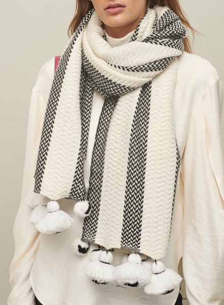 THE POM POM SCARF - Monochrome wool and cashmere striped scarf with pom poms - model