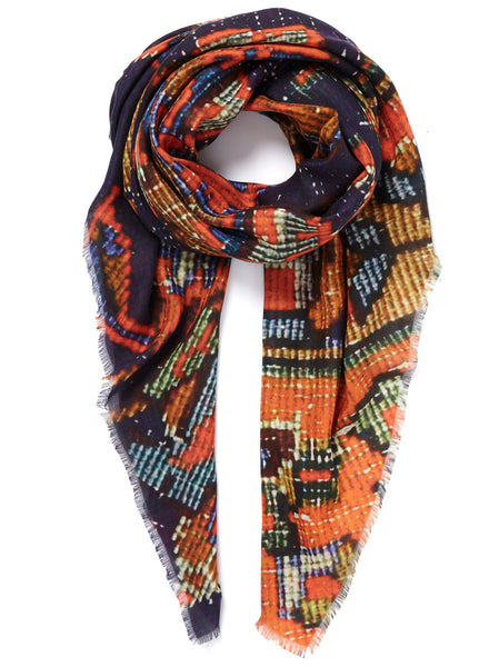 THE CARPET SQUARE - Navy and orange printed modal cashmere scarf - tied