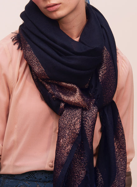 THE GILT SQUARE - Navy cashmere scarf with copper Lurex border - model