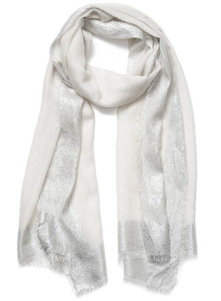 JANE CARR The Argent Wrap in White, white pure cashmere scarf with silver metallic border – tied