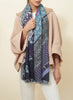 JANE CARR The Puzzle Wrap in Lagoon, blue multicolour printed modal and cashmere scarf – model 2
