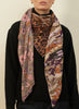 JANE CARR The Medley Square in Rose, pink multicolour printed modal and cashmere scarf – model 1