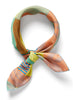 The Paradise Petit Foulard, yellow, orange and green silk twill scarf – tied
