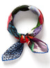The Chaos Neckerchief, blue multicolour printed cotton silk-blend scarf – tied