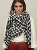 THE HOUNDSTOOTH SQUARE - Monochrome checked lambswool cashmere scarf with Lurex detail - model