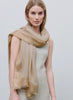 JANE CARR - THE ARGENT WRAP - Warm beige pure cashmere scarf with gold metallic border - model