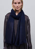JANE CARR - THE TANGO SCARF - Navy pure cashmere scarf with black metallic stripes - model