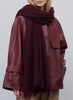 JANE CARR, THE LUXE - Burgundy oversized cashmere knit wrap - model