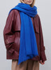 JANE CARR, THE LUXE - Royal blue oversized cashmere knit wrap - model