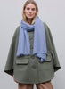 JANE CARR - THE FRAY SCARF - Dusky blue woven pure cashmere scarf - model