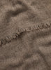 JANE CARR, THE FRAY SCARF - Dark taupe woven pure cashmere scarf - detail