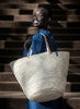 MIFUKO - Mkeka Basket Bag – Natural – model