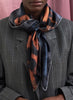 JANE CARR The Kitty Foulard in Guinness, brown and blue grey printed silk twill scarf – model