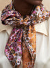 JANE CARR The Rickrack Foulard in Coral, pink and gold multicoloured printed silk twill scarf – model