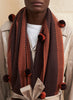 JANE CARR The Pom-Pom Scarf in Chocolate, brown wool and cashmere wrap with oversized pom poms – model