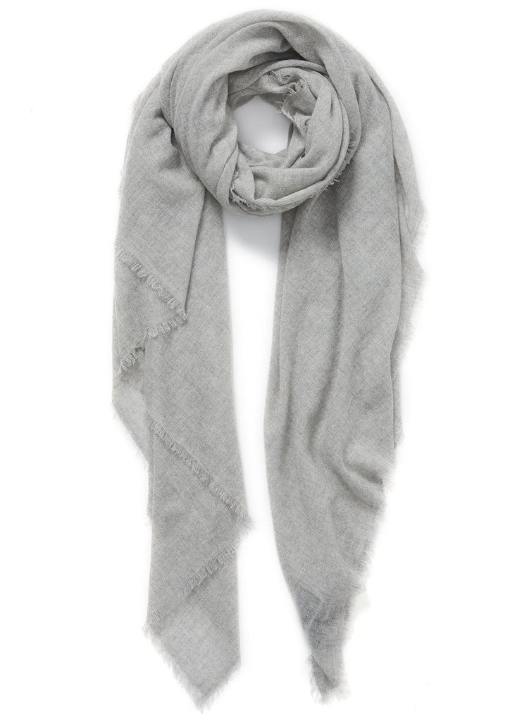 JANE CARR The Fray Wrap in Mist, pale grey woven pure cashmere scarf – tied