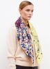 JANE CARR The Remix Foulard in Damson, purple multicolour printed silk twill scarf – model 2