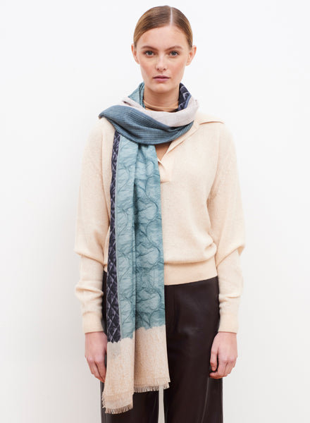 JANE CARR The Quilt Wrap in Denim, blue and cream printed modal and cashmere scarf - model 1