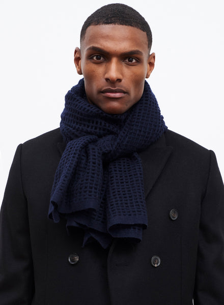 JANE CARR The Mesh Scarf in Navy, dark blue grid woven cashmere scarf – model 3
