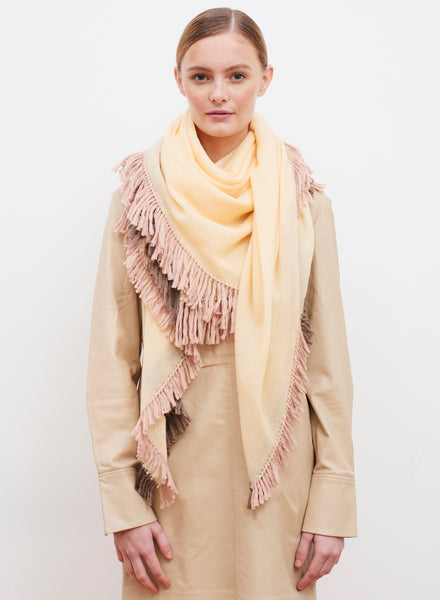JANE CARR The Chalet Square in Hay, cream cashmere scarf with oversized contrast fringes – model 1