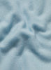 JANE CARR The Fray Wrap in Sky, pale blue woven pure cashmere scarf – detail