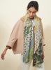JANE CARR The Puzzle Wrap in Jade, green multicolour printed modal and cashmere scarf – model 2