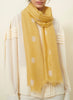 JANE CARR The Ikat Scarf in Sultan, yellow two tone pure cashmere woven scarf – model