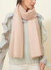 The Featherweight in Calamine, blush pink woven pure cashmere scarf - model
