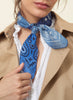 JANE CARR The Ranch Neckerchief in Mid Blue, blue printed cotton and silk-blend scarf – model