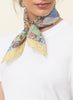 JANE CARR The Prairie Neckerchief in Sultan, yellow and blue multicolour printed cotton and silk-blend scarf – model