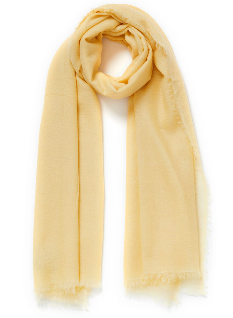 JANE CARR The Light Fray Wrap in Butter, yellow woven pure cashmere scarf - tied