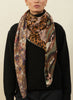 JANE CARR The Medley Square in Grey-green, neutral multicolour printed modal and cashmere scarf – model 1