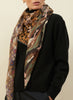 JANE CARR The Medley Square in Grey-green, neutral multicolour printed modal and cashmere scarf – model 2