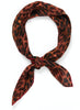 JANE CARR The Cub Neckerchief in Ginger, taupe and red printed printed modal and cashmere scarf – tied