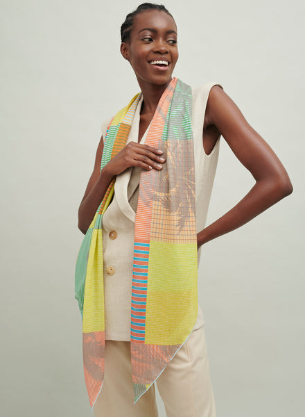 The Paradise Square, yellow, orange and green printed modal cashmere-blend scarf – model