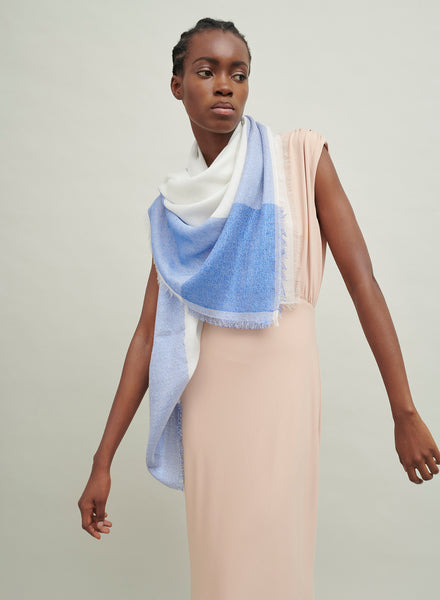 The Shimmer Square, white pure cashmere scarf with blue metallic border – model