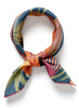 The Paradise Petit Foulard, orange, pink and blue silk twill scarf – tied