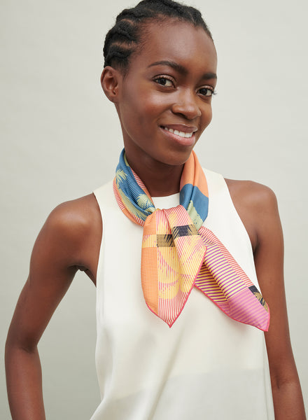 The Paradise Petit Foulard, orange, pink and blue silk twill scarf – model 1