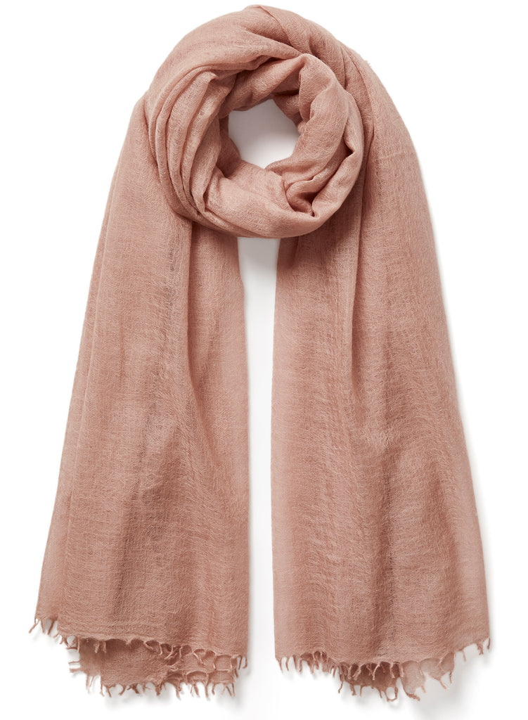 The Featherweight, light pink woven cashmere scarf - tied