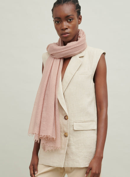 The Featherweight, light pink woven cashmere scarf – model