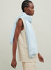The Featherweight, light blue woven cashmere scarf – model