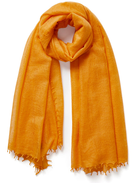 The Featherweight, orange woven cashmere scarf – tied