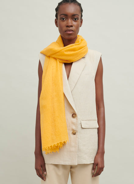 The Featherweight, orange woven cashmere scarf – model